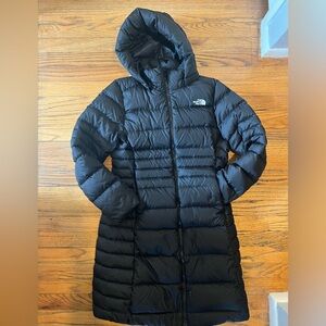 The North Face women's 3/4 length hooded coat size medium.
